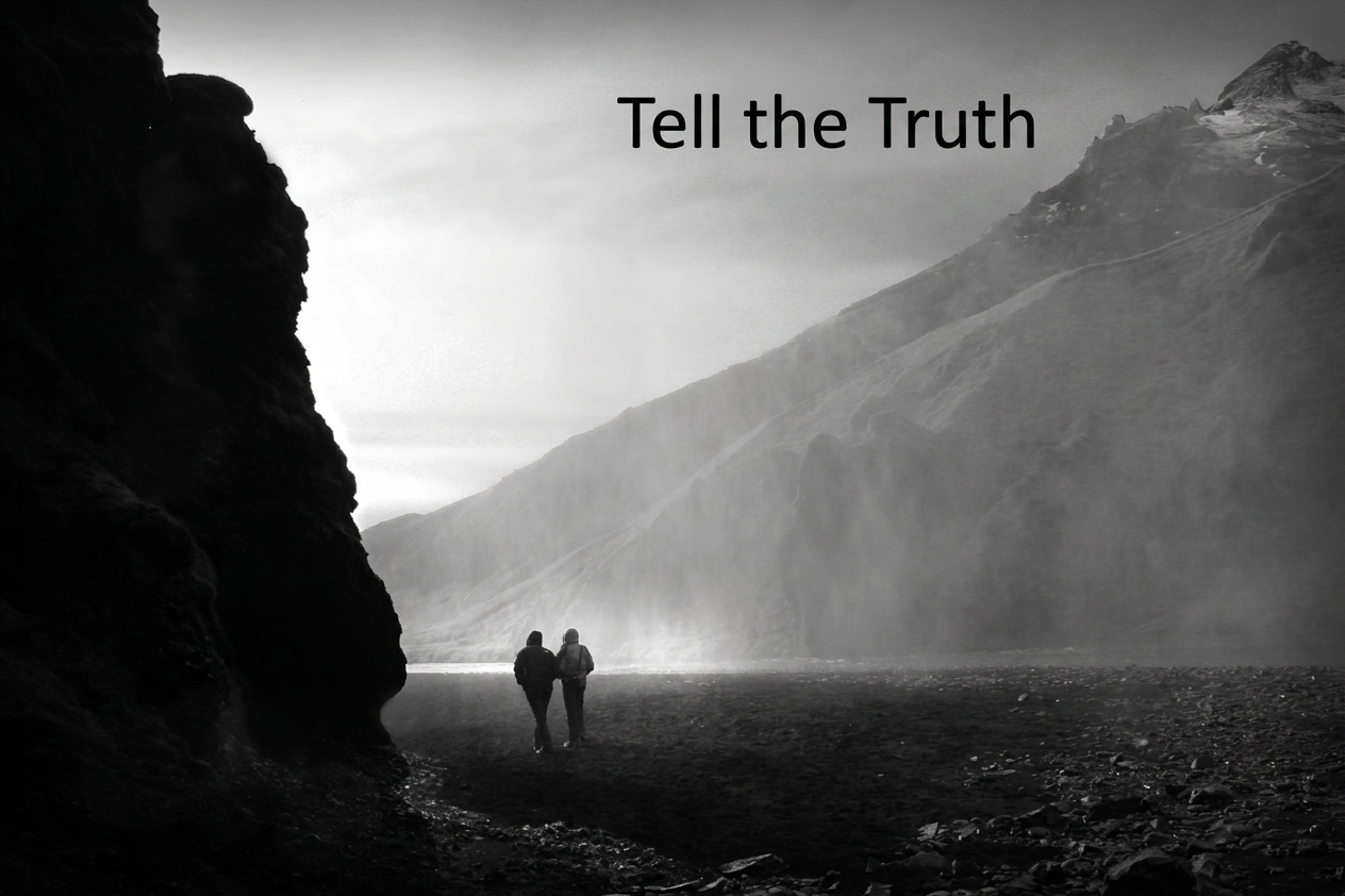 dramatic black and white mountain landscape with hikers